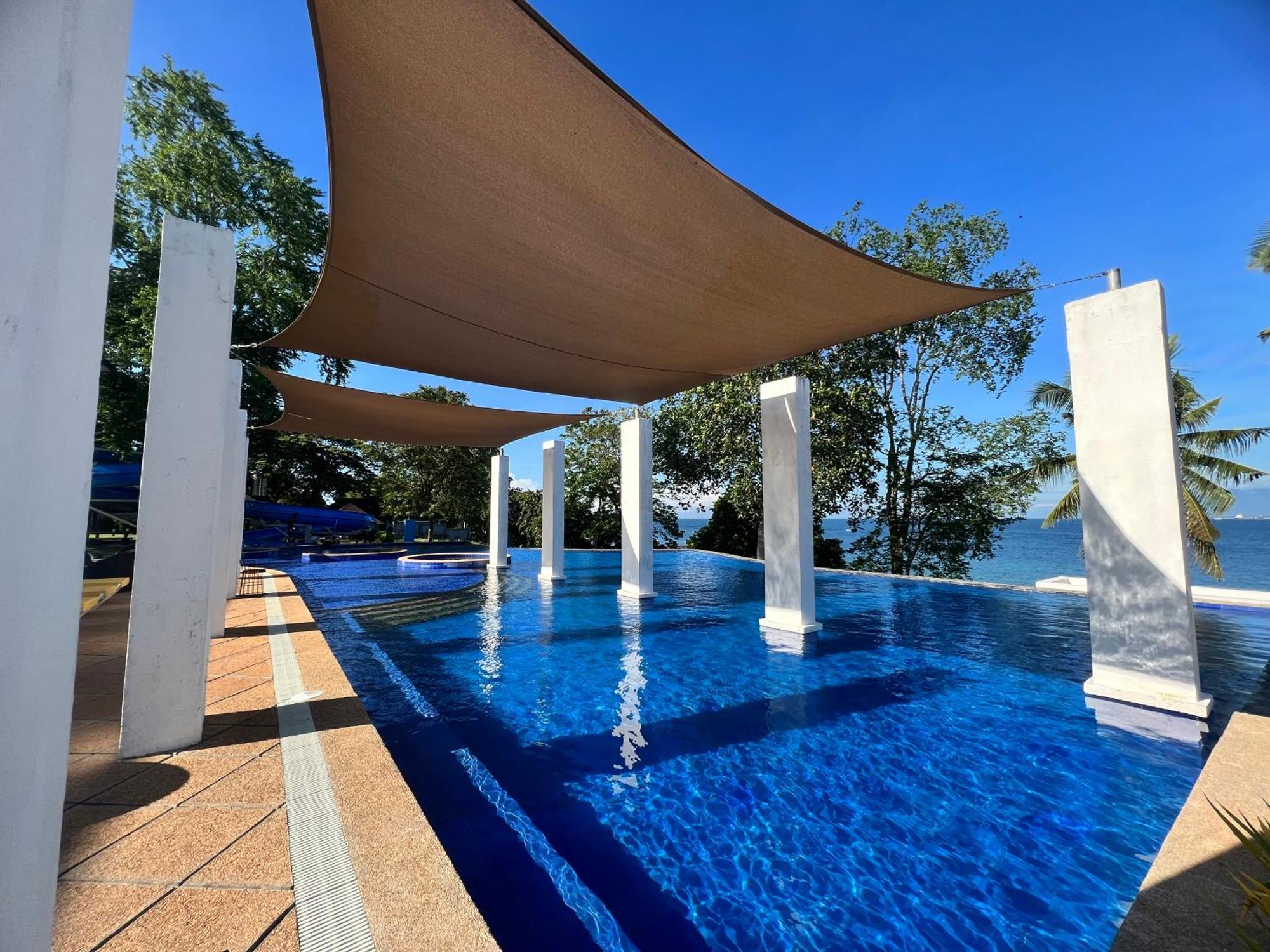 Crusoe Cabins Costa Azalea Samal Exterior foto